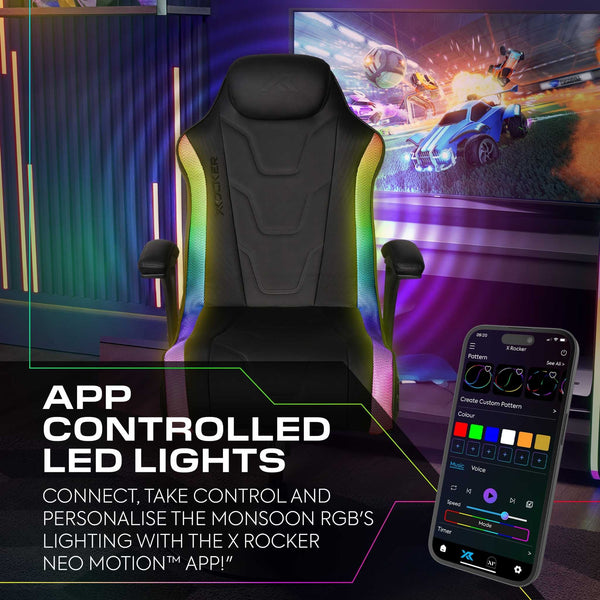 Gaming chair with app-controlled LED lights and smartphone displaying app interface.