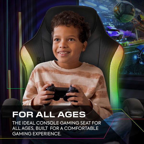 Child sitting in a gaming chair with a console gaming setup in the background