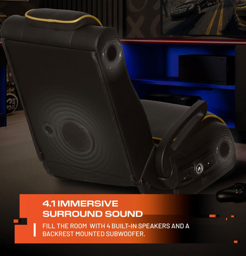 Black gaming chair with built-in speakers in a room setting