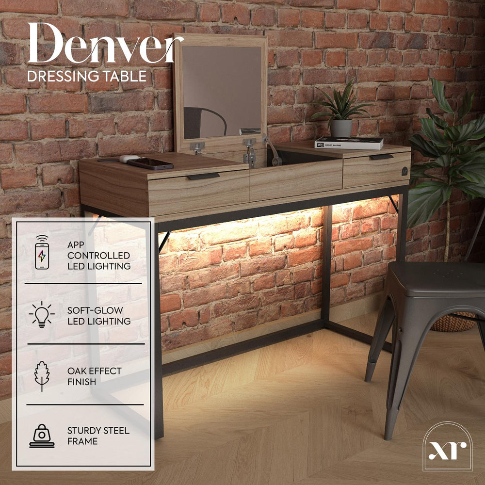 Wooden dressing table with mirror against a brick wall, featuring app-controlled LED lighting and oak effect finish.