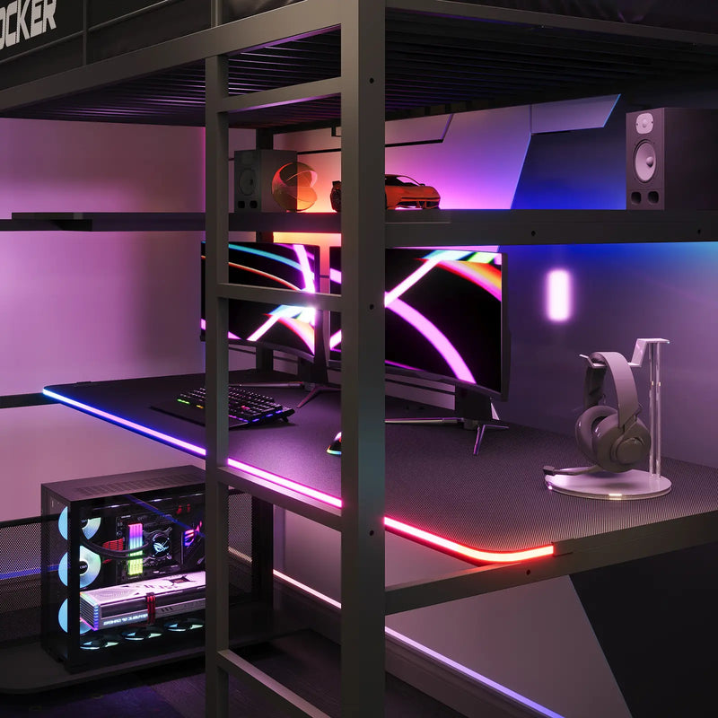 Gaming setup underneath a loft bed with RGB lighting on a desk