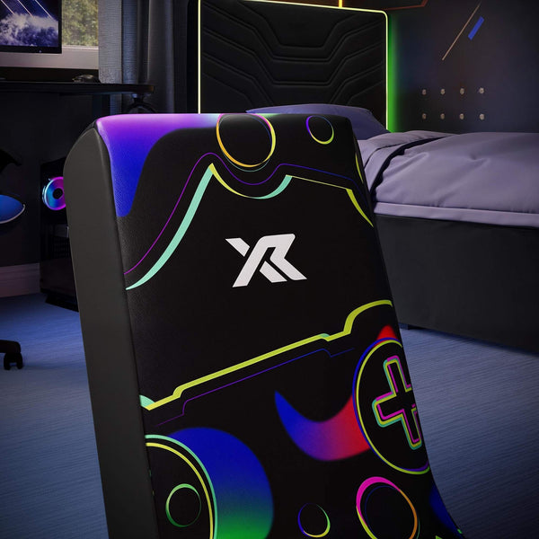 Gaming chair with colorful design and logo in a bedroom setting