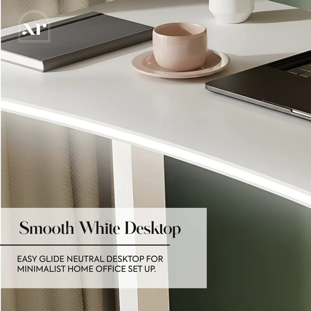 White desk with a laptop, notebook, and cup on a neutral background