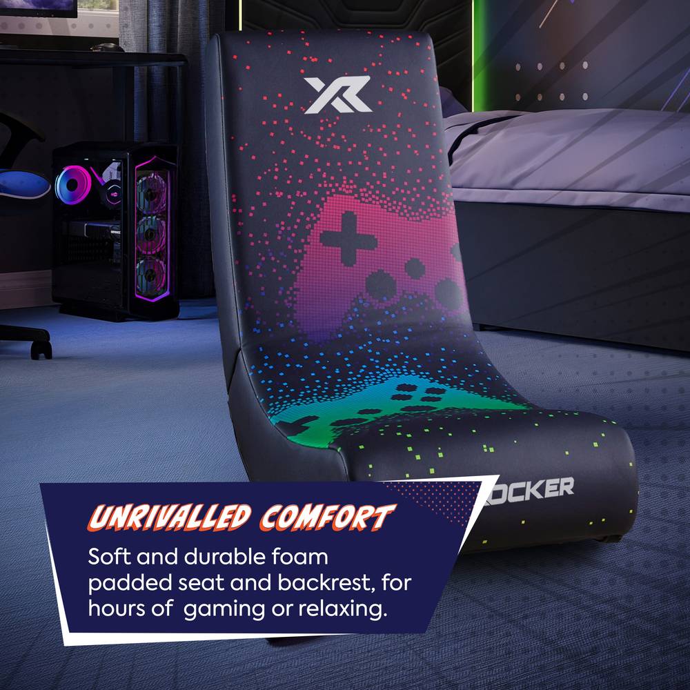 Gaming chair with colorful design in a room setup, highlighting comfort features.