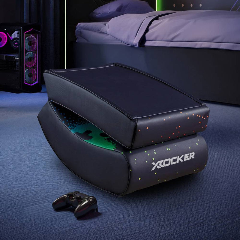 X rocker gaming chair with RGB lighting in a bedroom setting