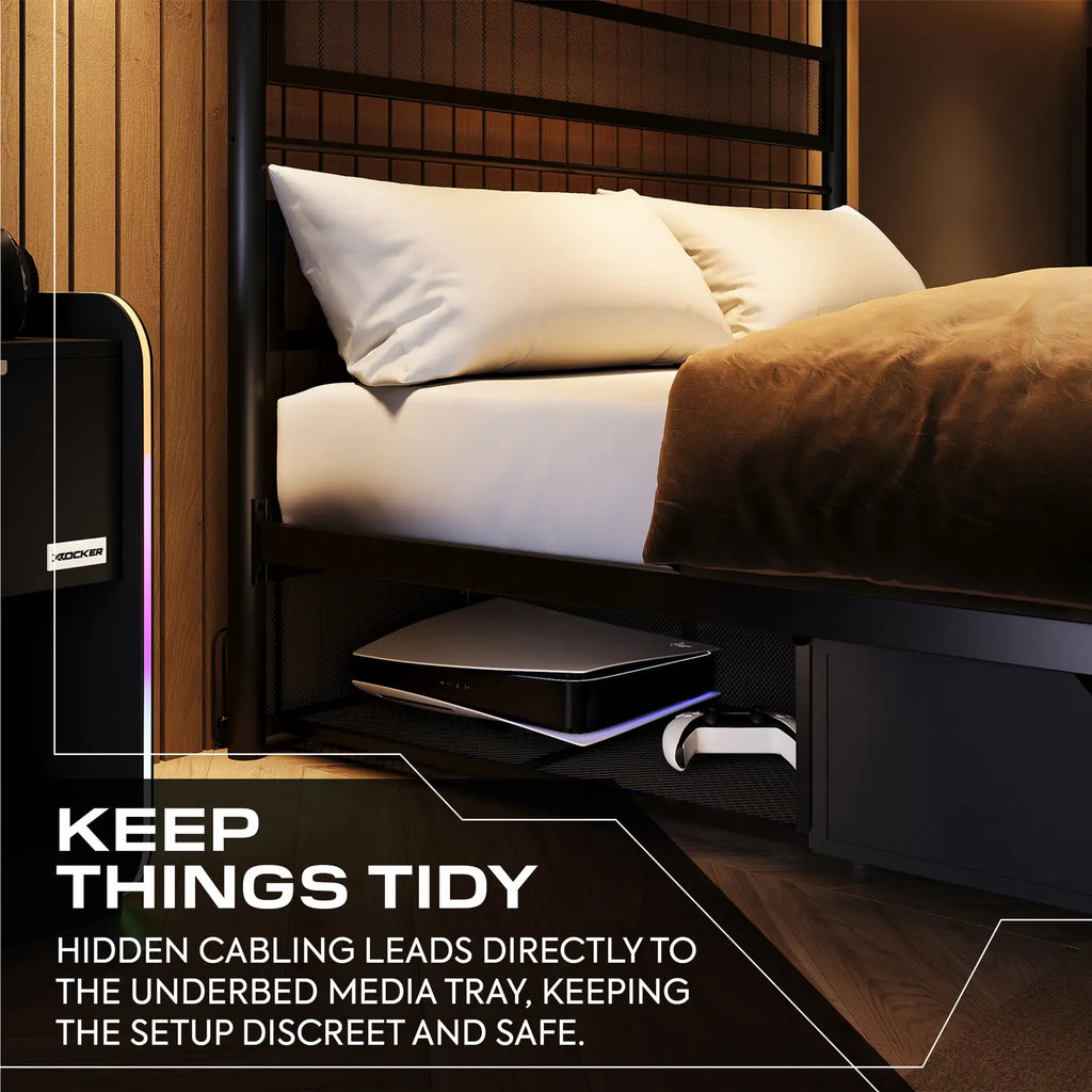 Bedroom setup with a bed and underbed media tray, featuring a hidden cabling system.