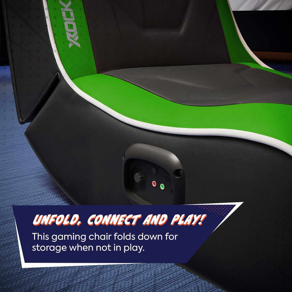 Gaming chair with green and black design, featuring text about folding and connecting for use.
