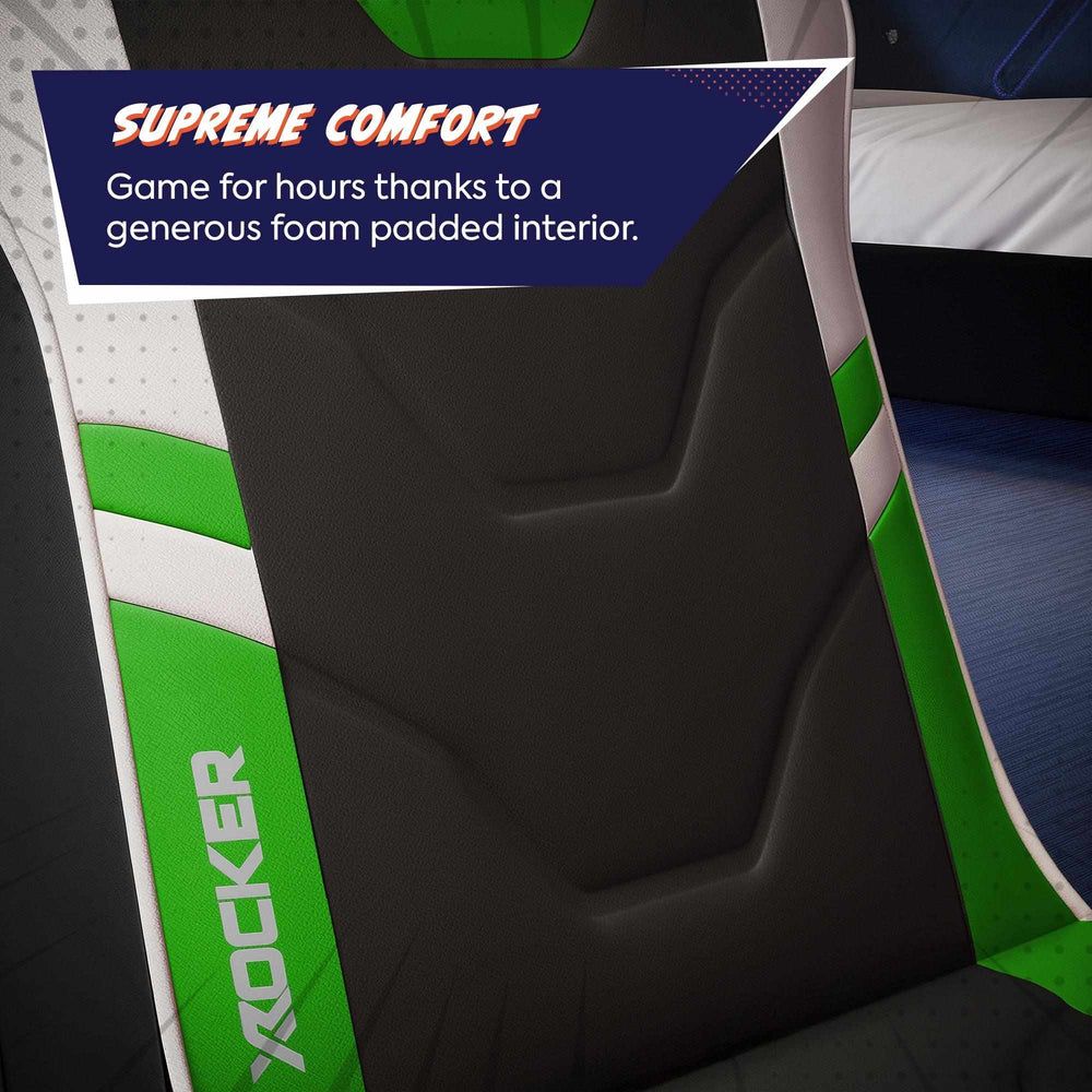 Close-up of a green and black gaming chair with 'X rocker' branding, highlighting comfort features.