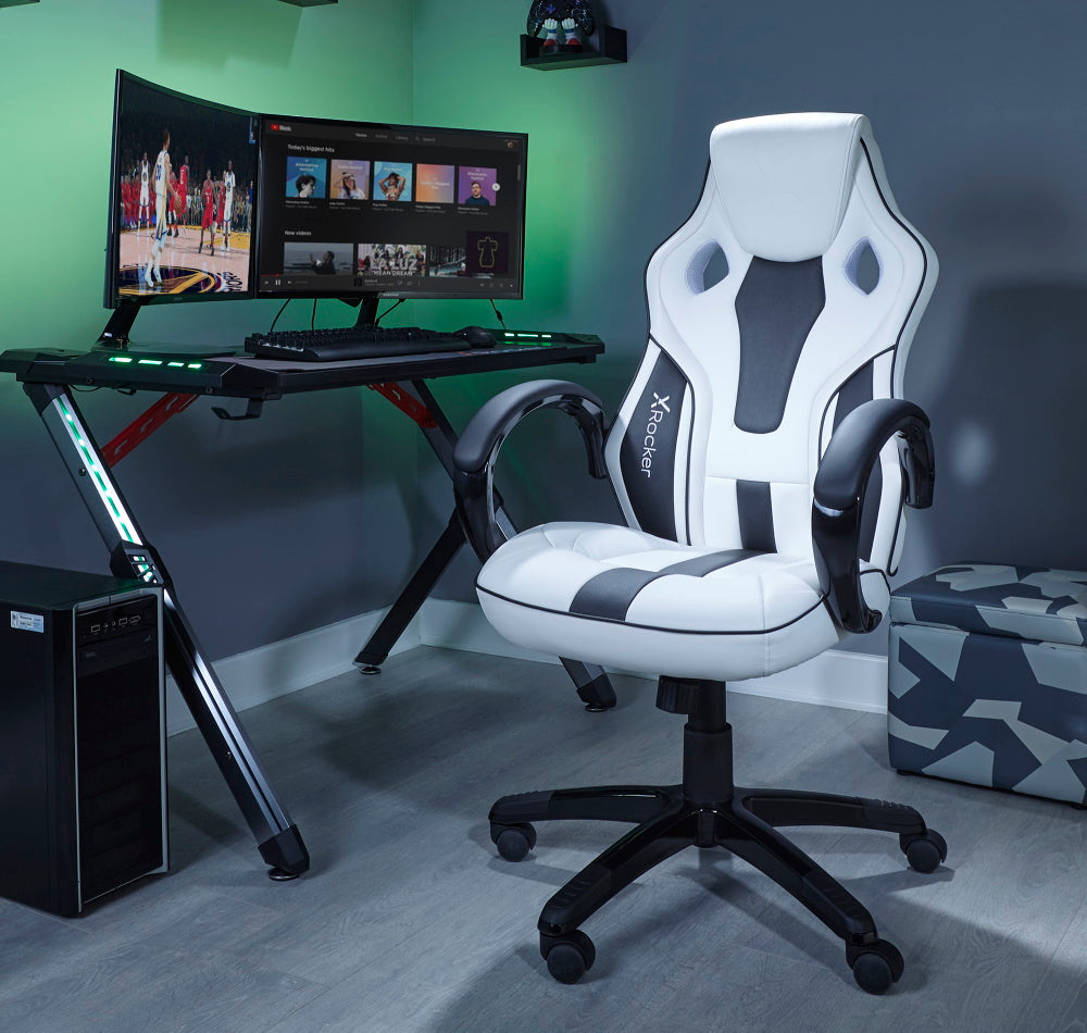 x rocker pc office gaming chair in white and black in a game room setting and LED light effect